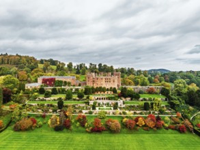 Autumn colours over Powis Castle and Garden from drone, Welshpool, Powys, Wales, England, United