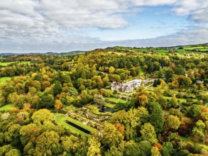 Autumn colours over Bodnant House and Garden from a drone, Conwy River, Colwyn Bay, Conwy, Wales,