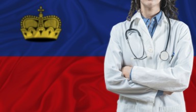 Medical professional on Liechtenstein flag. Healthcare and wellness in Liechtenstein, Concept
