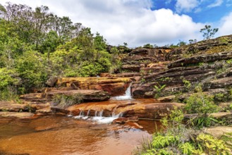 Stream flowing over rocks and forming small waterfalls in the state of Minas Gerais, Brazil, Minas