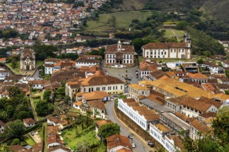 Historic city of Ouro Preto with its baroque and colonial houses and churches, viewed from above,