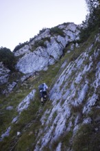 Hikers at the Iron Ladder on the way to Rettenkogel, Postalm, Osterhorn Group, Salzkammergut,