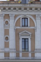 Windows of a building in the city of Rome, Italy