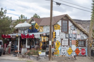 Goldfield, Nevada - An old house covered by road signs