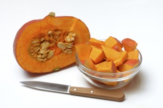 Hokkaido pumpkin, sliced with a knife
