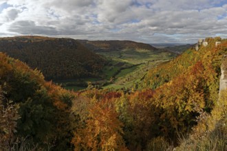 Panoramic picture of golden autumn in the Swabian Jura with colorful leaves and Reussenstein castle
