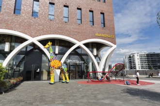 Westfield, shopping center, giraffe sculpture, artwork, mascot of the LEGO Discovery Centre on the