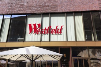 Lettering on glass façade, Westfield Überseequartier, modern shopping center, HafenCity, Hamburg,