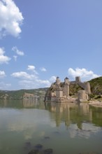 Golubac Fortress or Kolumbatz or Pigeon Town or Pigeon Castle on the Danube, in the background the