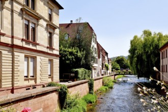 Ettlingen, Germany - August 13th 2025: Alb brook in historic center of Ettlingen, Germany. Small