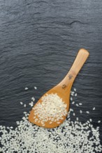 Rice grains with cooking spoon, rice