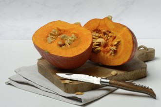 Hokkaido pumpkin, sliced with a knife