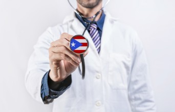 Puerto Rico healthcare system, doctor holding stethoscope. Puerto Rico health and medical insurance