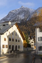 Engadin House, autumn, Piz Mezzaun, mountain peaks with snow, La Punt Chamue, Engadin, Graubünden,