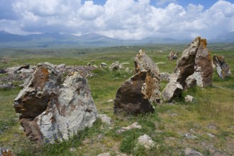 A series of stone monuments on a grassy area, stone circle, megaliths, Zorats Karer, Karahundsch,
