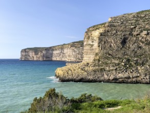 Rugged high cliffs on the Mediterranean Sea of Gozo Island, Gozo, Malta