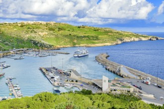 View from elevated position of ferry car ferry leaving Mgarr port of Gozo island, Gozo, Malta