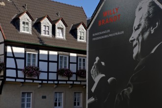 Huge poster with Willy Brandt portrait on a fire wall of the Willy Brandt Forum next to a