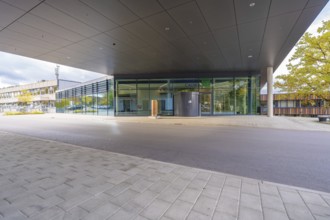 Modern building with covered entrance and large glass front, Calw District Office, Calw, Germany