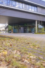 Modern building with glass façade in autumn surroundings, flat roof, Calw District Office, Calw,