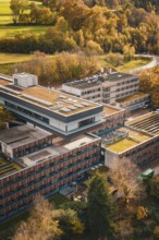 Modern buildings with green roofs in the midst of an autumn landscape, Calw District Office, Calw,