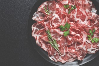 Sliced cured ham, prosciutto, italian dish, delicacy, parma ham, top view, no people