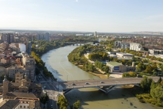 View looking down of modern bridge Puente de Santiago spanning the River Ebro, Zaragoza, Aragon,
