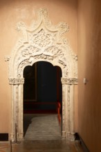 Ornate doorway detail in the Throne Room from time of the Catholic monarchs, Aljafería Palace,
