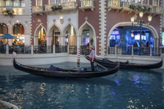 Las Vegas, Nevada - A gondolier looks for customers on the indoor canals at The Venetian Resort