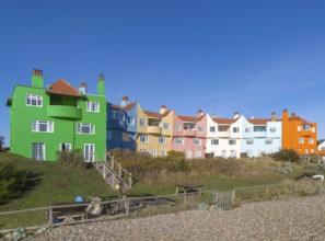 Colourful 1930s seaside houses called The Headlands on the beach at Thorpeness, Suffolk, England,