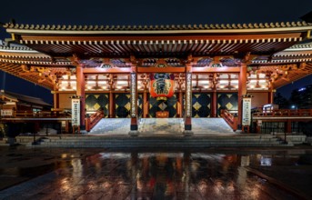 Illuminated main hall of Asakusa Shrine or Senso-ji Temple, at night, Buddhist temple complex,