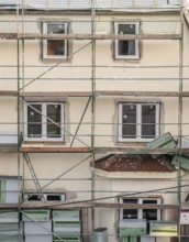 Energetic renovation of an apartment building, renovation of an old building, thermal insulation,