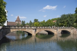 Maxbrücke with reflection, Pegnitz river, Nuremberg, Middle Franconia, Franconia, Bavaria, Germany