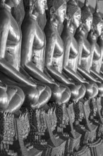 Gilded Buddha statues (Bhumispara mudra: Buddha Gautama at the moment of enlightenment), Wat Suthat