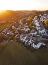 Residential area on the edge of a settlement in autumn sunset light, Deufringen, Aidlingen,