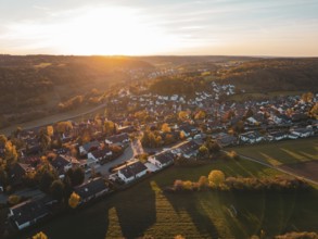 Autumn village at sunset with softly lit landscape, Deufringen, Aidlingen, Böblingen district,