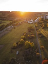 Fields and village at sunset surrounded by autumn light, Deufringen, Aidlingen, Böblingen district,