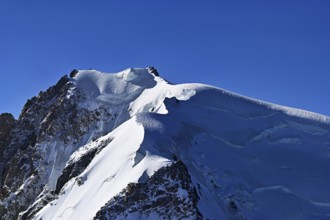 View of the snow-covered Mont Blanc du Tacul from the Aiguille du Midi, Chamonix-Mont-Blanc,