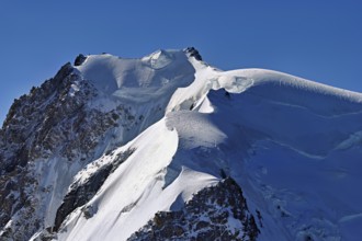 View of the snow-covered Mont Blanc du Tacul from the Aiguille du Midi, Chamonix-Mont-Blanc,