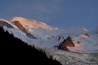 Snow-covered Mont-Blanc in the light of the setting sun, Chamonix-Mont-Blanc, Haute-Savoie, France