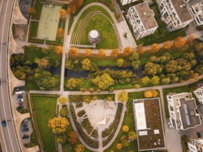 City view with a curved viaduct surrounded by houses and autumn landscape, Nagold, Black Forest,