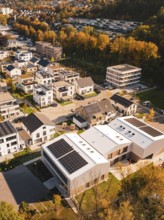 Urban aerial view of residential area with autumn colors and modern architecture, Nagold, Black