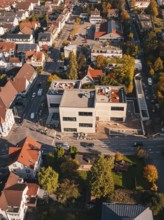 City district in autumn with colorful leaves and modern architecture, Nagold, Black Forest, Germany