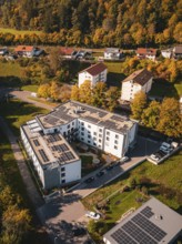 Building complex in autumn surroundings, photographed from above, Nagold, Black Forest, Germany