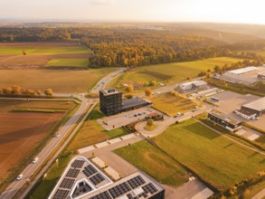 Drone shot of a rural area with forests and fields in soft autumn light, Nagold, Black Forest,