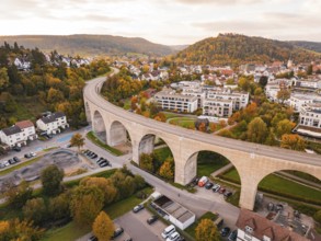 Aerial view of a city with a long bridge in an autumn scene, Nagold, Black Forest, Germany