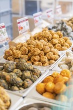 Colourful vegetarian foods displayed in rows at a market stand, Streuobstmarkt, Sindelfingen,