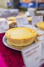 Close-up of a cheesecake on a silver plate at a market stand, Streuobstmarkt, Sindelfingen,