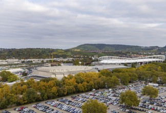 Neckarpark Stuttgart with Hanns-Martin-Schleyer-Hall and MHP Arena. Cars parked on the Wasen