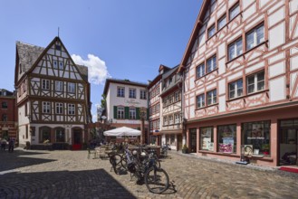 Historic half-timbered houses, general architecture, buildings, paving stone square, bicycles,